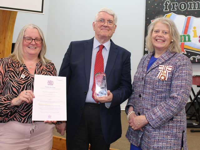 Jo Hughes, Mike Nicholls (Chairman of Selsey Community Forum) and Dame Emma Barnard (Lord-Lieutenant of West Sussex) with the Award.