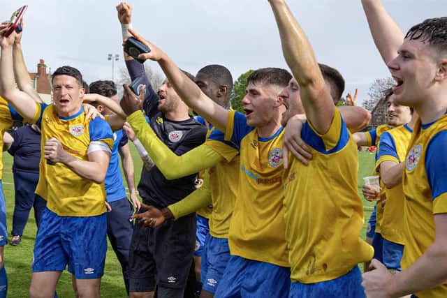 Eastbourne Town players celebrate ptomotion | Picture: Josh Claxton