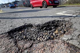 Just one of the many potholes in Junction Road, Burgess Hill