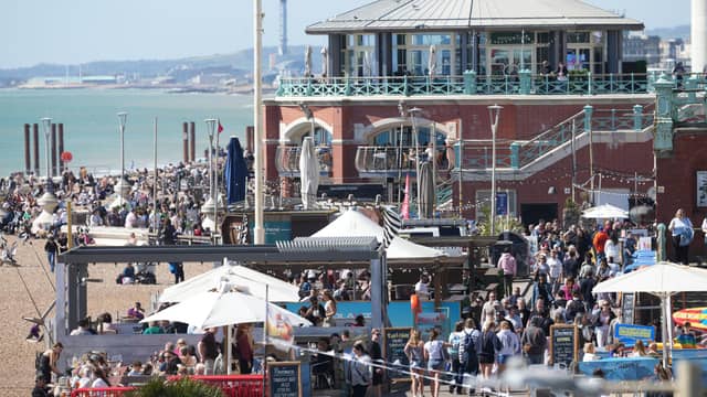Brighton beach is busy today (April 7, 2026) on what is the hottest day of the year so far