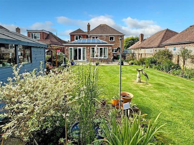 This five-bedroom detached house in a private road has come on the market with Glyn Jones priced at £650,000.