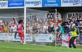 Ayo Olasimbo and Hastings United fans celebrate the amazing comeback v Crowborough | Jon Smalldon
