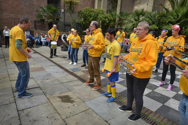 Sambalanco drumming in Hastings Old Town to raise funds towards Jack in the Green after the council pulled its funding for the event from 2025.
