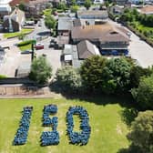 All pupils at Broadwater CE Primary made up the numbers 150 for a drone photograph