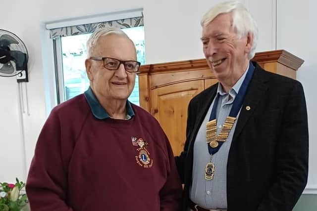 Tony is pictured (left) receiving his award from John Todd (right) | Picture by Terri Stephens