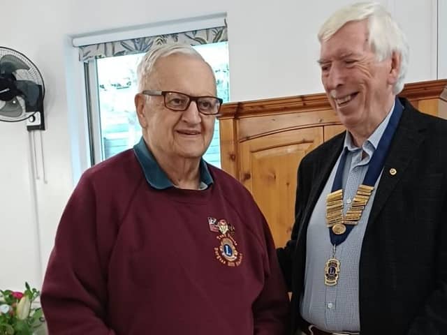 Tony is pictured (left) receiving his award from John Todd (right) | Picture by Terri Stephens