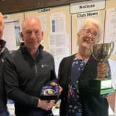 Ian Cherriman recives the John Neale Trophy from Sue Neale