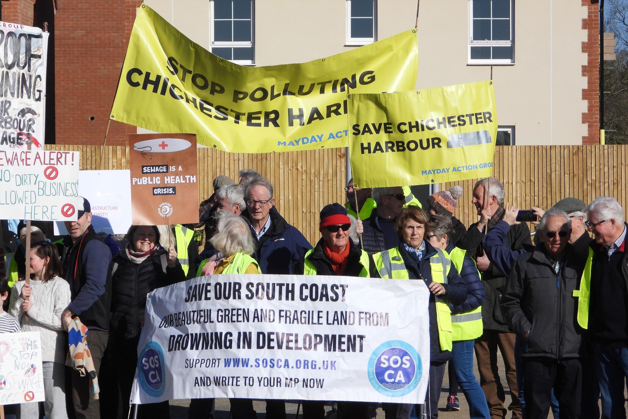 Hundreds rally over sewage concerns at proposed 300-home development in ...