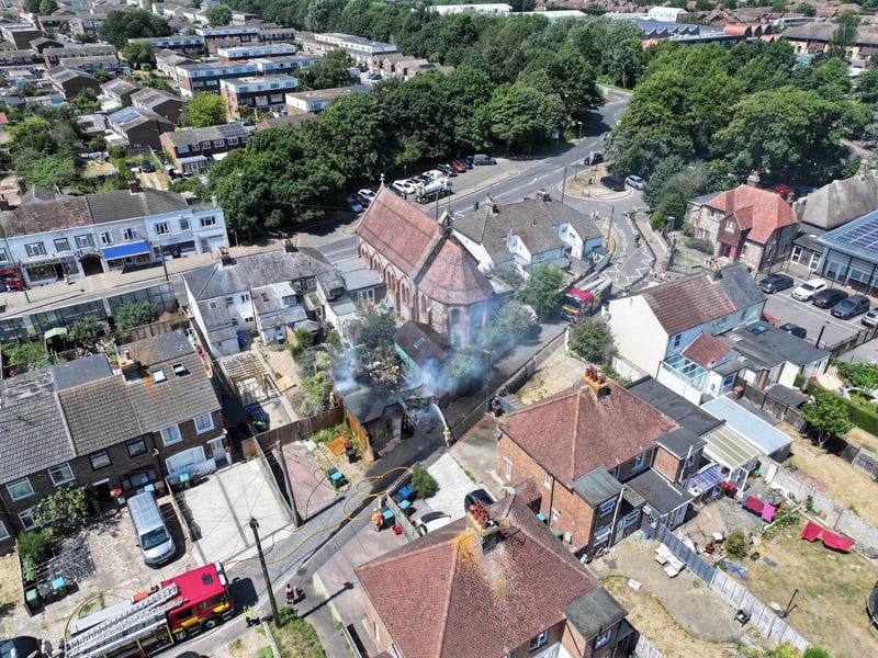Firefighters tackle a blaze that destroyed two sheds, on Beaconsfield Road