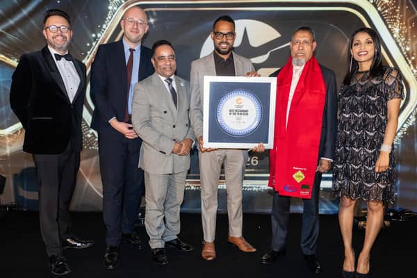The Viceroy chef Shahidul Islam and owner Abdus Shukur holding the award. From left: host Jon Kay, Weymouth MP Lloyd Hatton, sponsor Lutfur Rahman and host Luxmy Gopal. Photo contributed by Curry Life Magazine