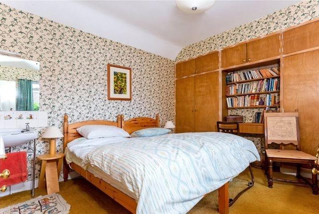 Large bedroom with built-in storage