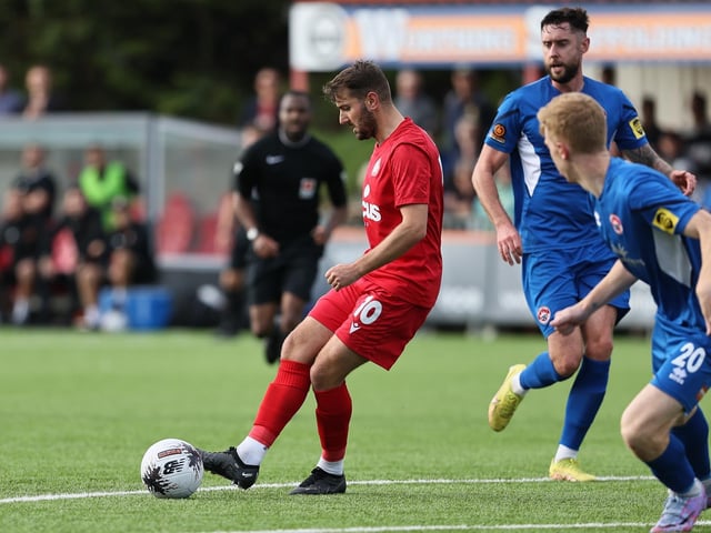 National League South action at Woodside Road between Worthing and Truro City