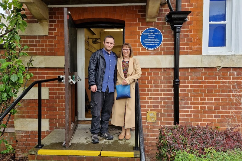 John's granddaughter, Amanda O'Carroll, and her son Trystan Scales by the blue plaque