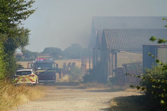 Dramatic pictures as firefighters tackle barn fire in Hailsham