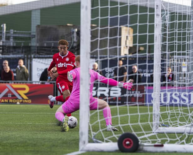 Dom Hutchinson dances through for Worthing's fifth | Picture by Jay Wrighte