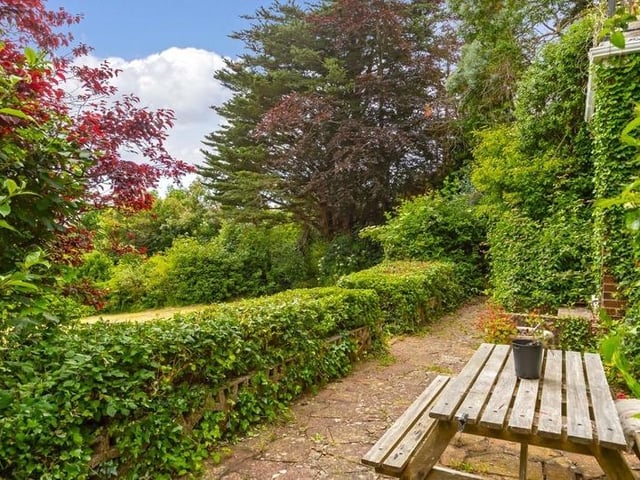 This substantial detached family house sits on the highest point in North Lancing, with grounds totalling 0.5 acres of land. Offers in the region of £1million are invited for this four-bedroom property at the foot of the South Downs National Park, with magnificent panoramic coastal views.
