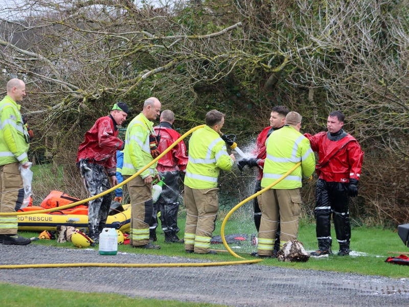 The emergency services came out in force to rescue a family who became stuck in the mud in West Wittering over the weekend.