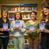 Ellie Wyatt (left) and Becky Jerams (right) with Burgess Hill Girls students. Tim Osborne Photography