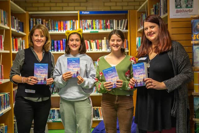 Ellie Wyatt (left) and Becky Jerams (right) with Burgess Hill Girls students. Tim Osborne Photography
