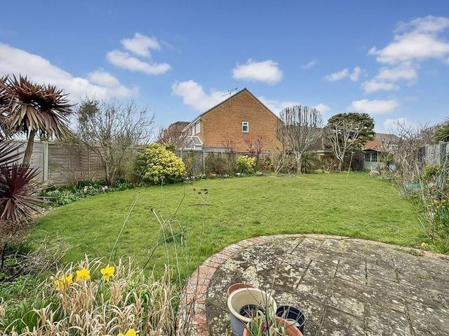 The summer house is tucked away right at the end of the garden