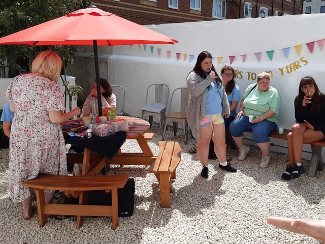 Frontline Associates Supported Tenancies celebrates the company's 20th anniversary and the first anniversary of the Frontline Hub, in Rowlands Road, Worthing, with a party for staff, service users and guests included Worthing town crier Bob Smytherman