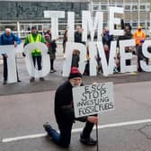 Members of Divest East Sussex held up a huge message at County Hall in Lewes on Tuesday, February 6