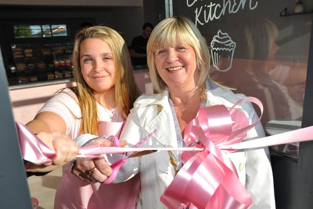 Charlotte Matthews (left) at the opening of Charlotte's Kitchen, with Rustington Parish Council chairman Alison Cooper. Pic S Robards SR23012902