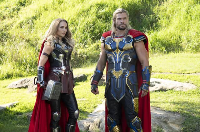 Undated film still handout from Thor: Love and Thunder. Pictured: (L-R): Natalie Portman as Mighty Thor and Chris Hemsworth as Thor in Marvel Studios' Thor: Love and Thunder. See PA Feature SHOWBIZ Film Thor. Picture credit should read: PA Photo/©Marvel Studios 2022/Jasin Boland. All Rights Reserved. WARNING: This picture must only be used to accompany PA Feature SHOWBIZ Film Thor..
