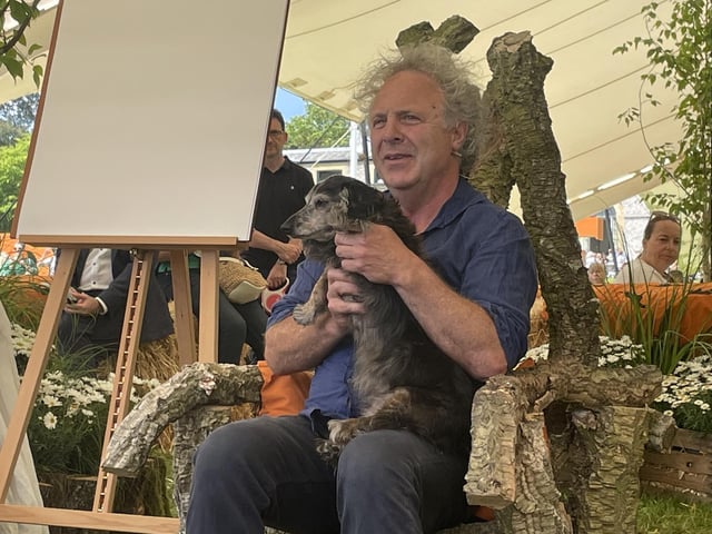 Charlie Mackesy with his dog Barney at the Literary Corner.