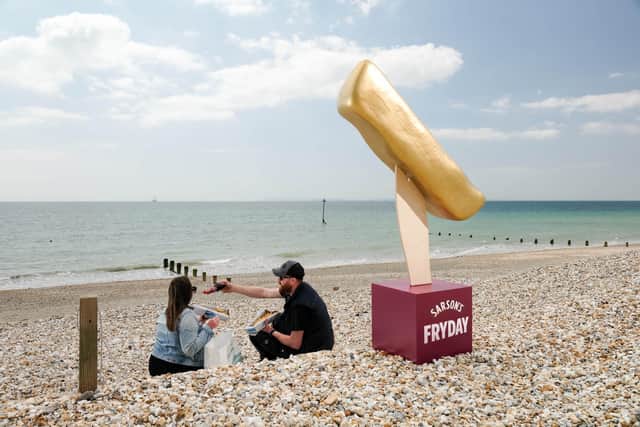 This weekend, Sarson’s will be sloshing onto the shores of Brighton giving away free chips in a bid to protect the city's much-loved dish, fish and chips. Picture by Richard Dawson/PA Media.