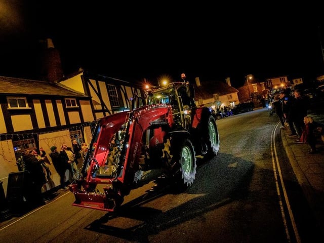 Many of the tractors came decked out with an array of Christmas lights.