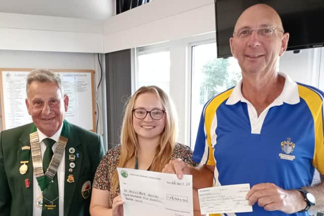 Ellie Beadell from  St Barnabas House hospice with Mark Cohen, left, and Richard Krupa at Worthing Pavilion Bowling Club