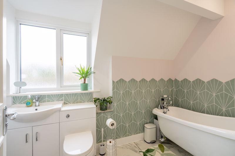 The newly-fitted bathroom features a beautiful freestanding bathroom.