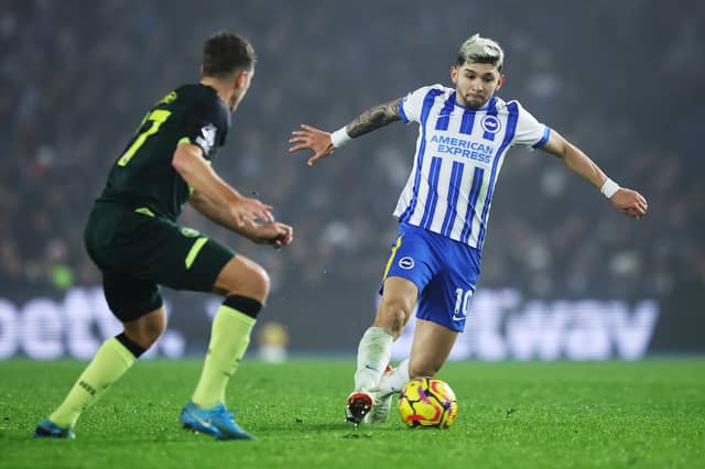 Julio Enciso of Brighton & Hove Albion controls the ball whilst under pressure from Vitaly Janelt of Brentford during the Premier League match at the Amex Stadium