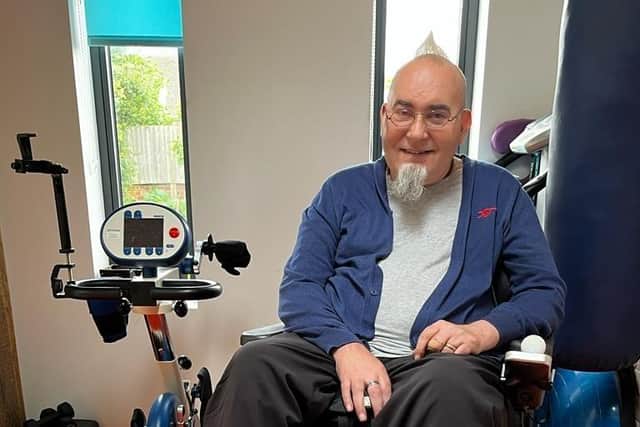 Graham Watson Brown is using a Thera-Trainer bike at his home in Goring for his My MS Marathon for the national charity MS-UK. Picture: MS-UK / Submitted