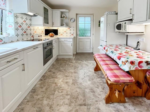 This three-bedroom, detached house with a stunning south-facing garden has come on the market with Graham Butt priced at £695,000
