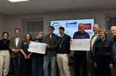 Bike Ride Committee and sponsors pictured with representatives of the chosen charities.