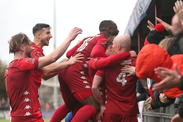 Worthing players celebrate on their way to beating Havant | Picture: Mike Gunn