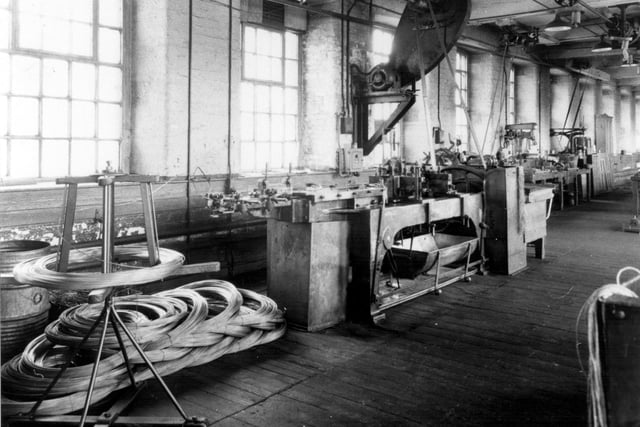 An umbrella rib-making machine, gentleman's type, starting end, at Samuel Fox and Co. Ltd Stocksbridge Works, in the early 1900s. Ref no: s09932