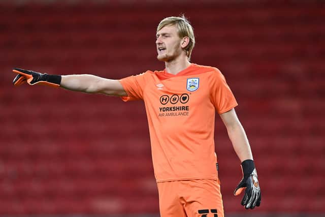 MIDDLESBROUGH, ENGLAND - FEBRUARY 16: Huddersfield goalkeeper Ryan Schofield reacts during the Sky Bet Championship match between Middlesbrough and Huddersfield Town at Riverside Stadium on February 16, 2021 in Middlesbrough, England. Sporting stadiums around the UK remain under strict restrictions due to the Coronavirus Pandemic as Government social distancing laws prohibit fans inside venues resulting in games being played behind closed doors. (Photo by Stu Forster/Getty Images)