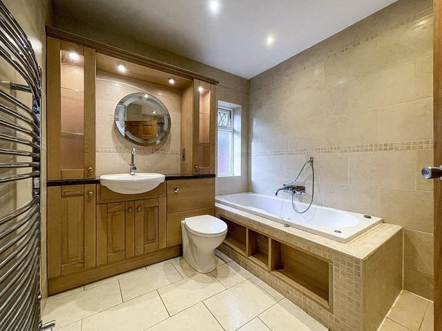 This four-bedroom detached house on the prestigious Goring Hall estate has just come on the market with Coast & Country Real Estate at a guide price of £800,000