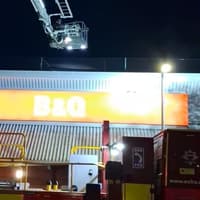 Fire Service rescue bird stuck in netting at B&Q at Bexhill