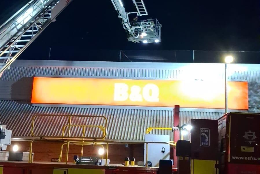Fire Service rescue bird stuck in netting at B&Q at Bexhill