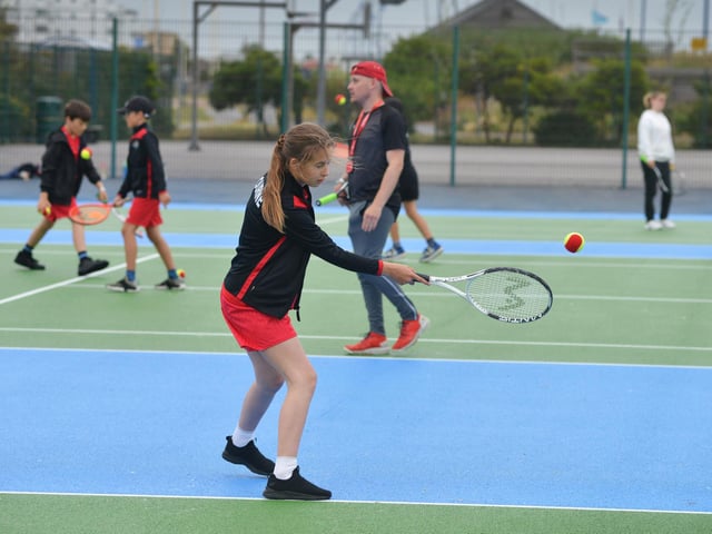 Culture Secretary Lucy Frazer marks the refurbishment of 1,000 public tennis courts. Photocall on June 29 at the tennis courts on Royal Parade, Eastbourne, with children from Bourne Primary School and Scott Lloyd, CEO Lawn Tennis Association.