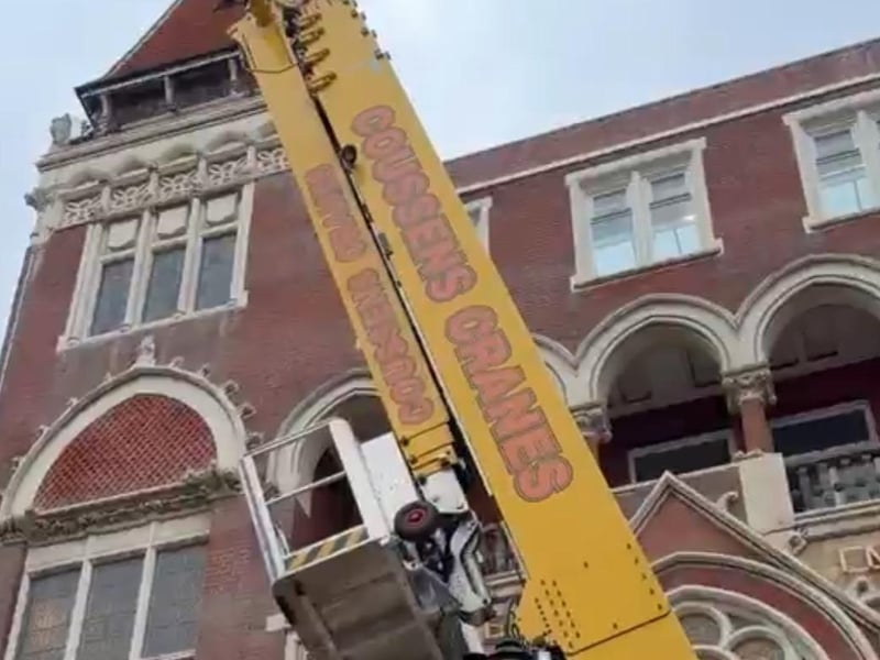Bird rescued from Hastings Library building by using giant crane