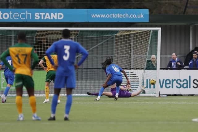 Horsham goalkeeper brilliantly denies Wingate & Finchley's William Ompreon from the spot