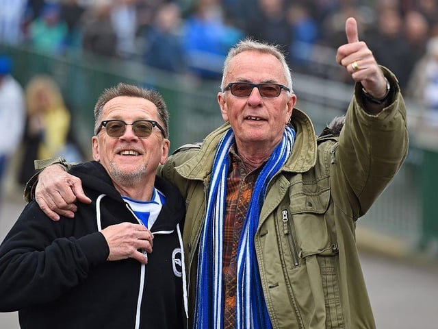 Fans arrive at the stadium prior to kick-off during the Sky Bet Championship match between Brighton and Hove Albion and Derby County at the Amex Stadium on May 2, 2016.