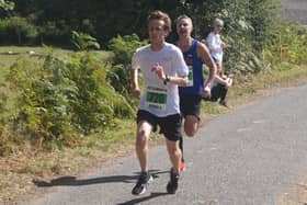 Action from a past running of the Fittleworth Five