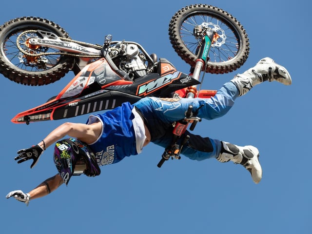 A motocross rider pulls off a death-defying, mid-air stunt. Photo: Michael John Reed,.