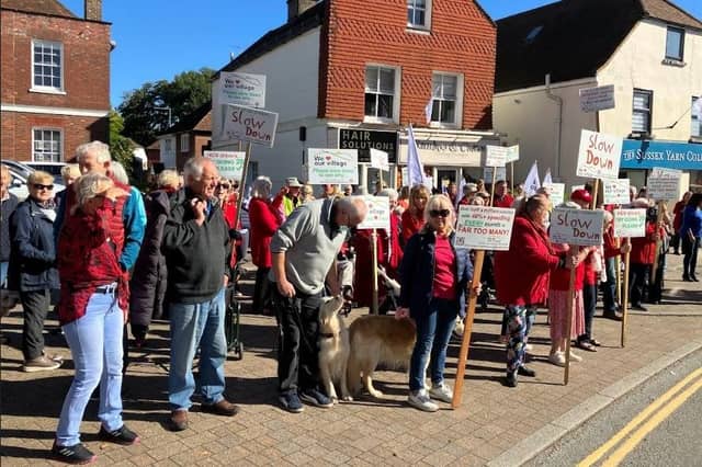 Placard-waving campaigners were out in force in Storrington on Saturday protesting over speeding heavy traffic in the village